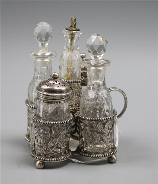 A Victorian five-bottle silver-mounted breakfast cruet,